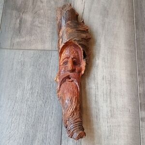 Hand-Carved Wooden Face Sculpture